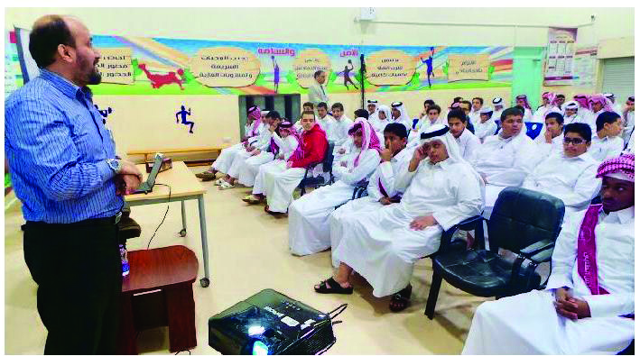 A lecture being delivered by a WEYAK official at Smaisma School.