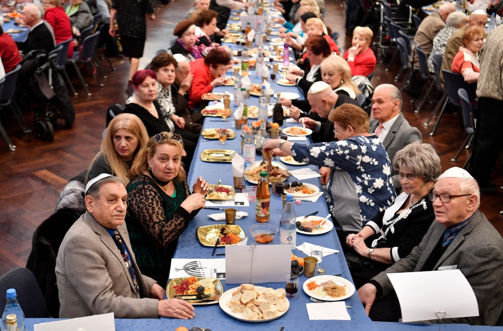 Guests attend the International Holocaust Survivors Night in Berlin on December 4, 2018. AFP / John Macdougall 