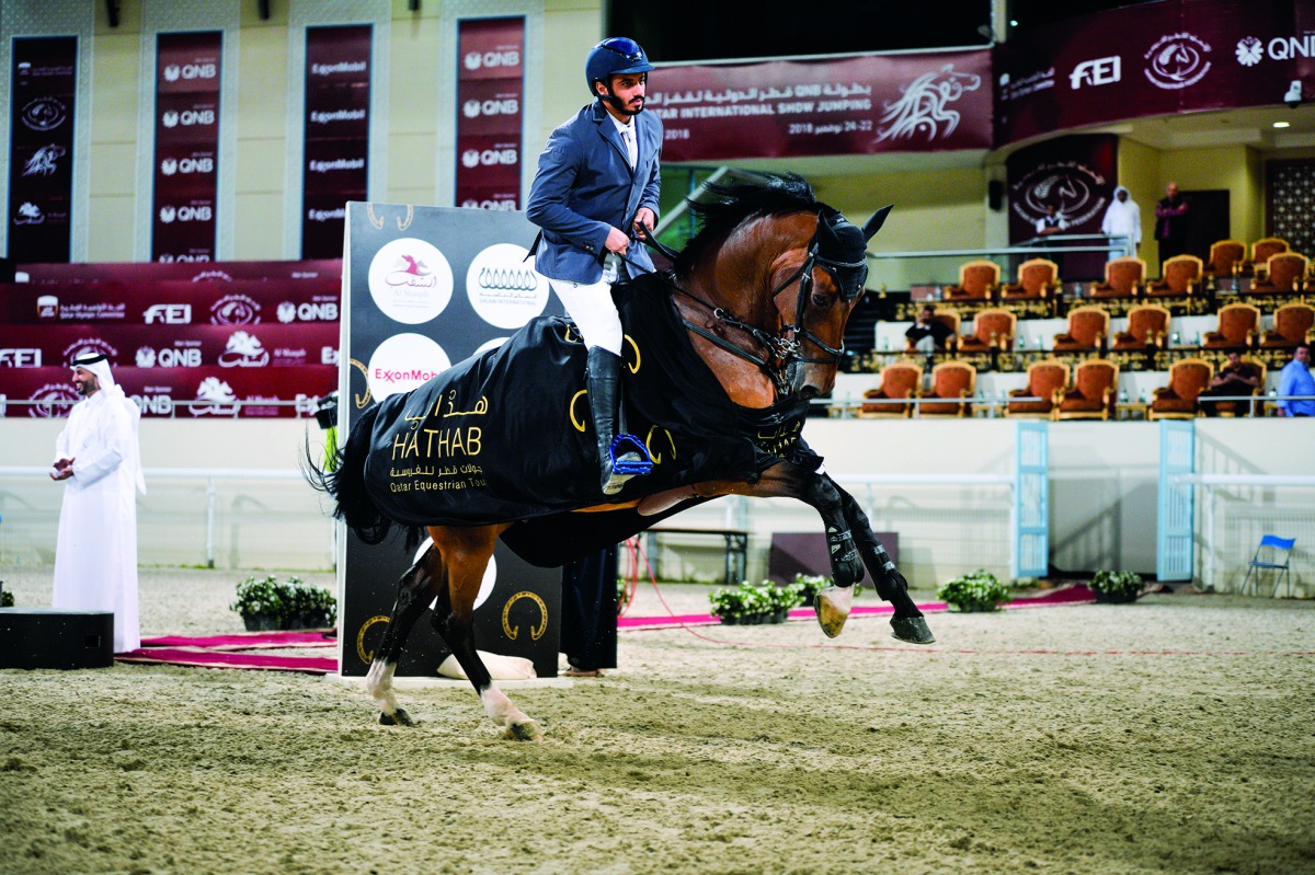 Saeed Nasser Al Qadi arriving at the presentation ceremony astride Daydreamer EC after winning the Medium Tour event yesterday. 