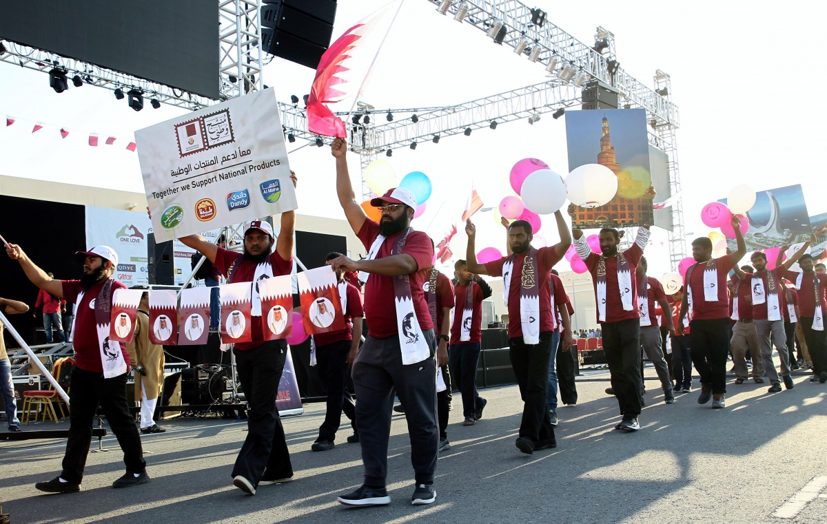 The views of the parade, procession and other activities organised by the expatriate communities to mark the National Day at Asian Town yesterday. Pics: Qassim Rahmatullah / The Peninsula 