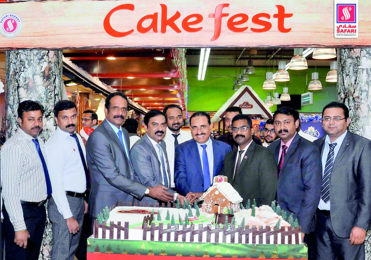 Zainul Abidheen, Director & General Manager, Safari Group of Companies, with staff during the launch of the Cake Festival at Safari Mall, Abu Hamour. 
