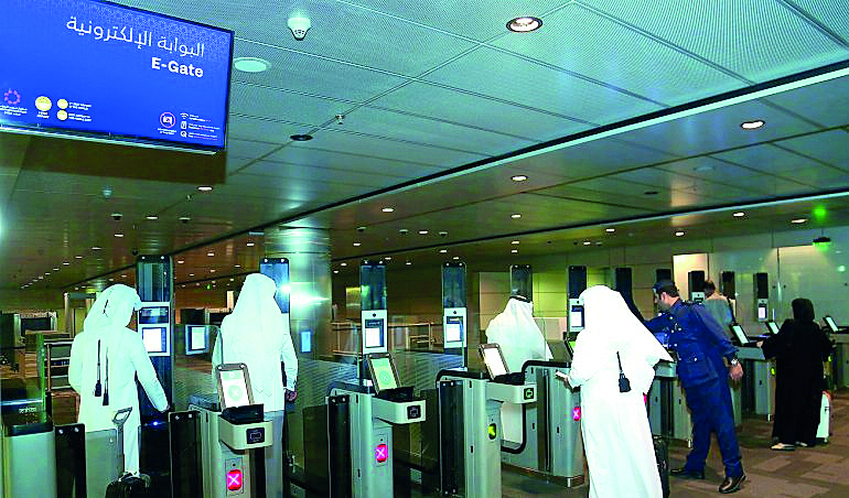 A file picture shows travellers using the e-gate at the Hamad International Airport.