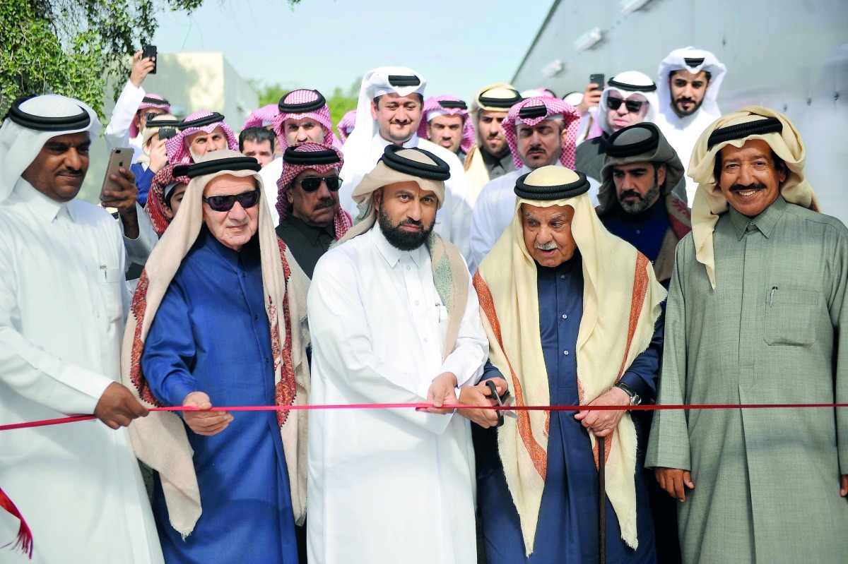 Yusuf Khalid Al Khulaifi (centre), Director of Agriculture Affairs, and other dignitaries cutting a ribbon to mark the opening of the agriculture education hall at the Global Farm for Agricultural Supply, yesterday. Pic: Abdul Basit / The Peninsula