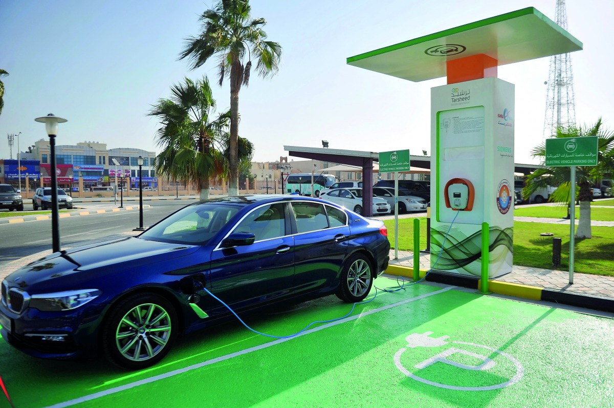 An electric vehicle charging station was opened yesterday at Qatar Scientific Club in the presence of Kahramaa officials. Pic: Abdul Basit / The Peninsula