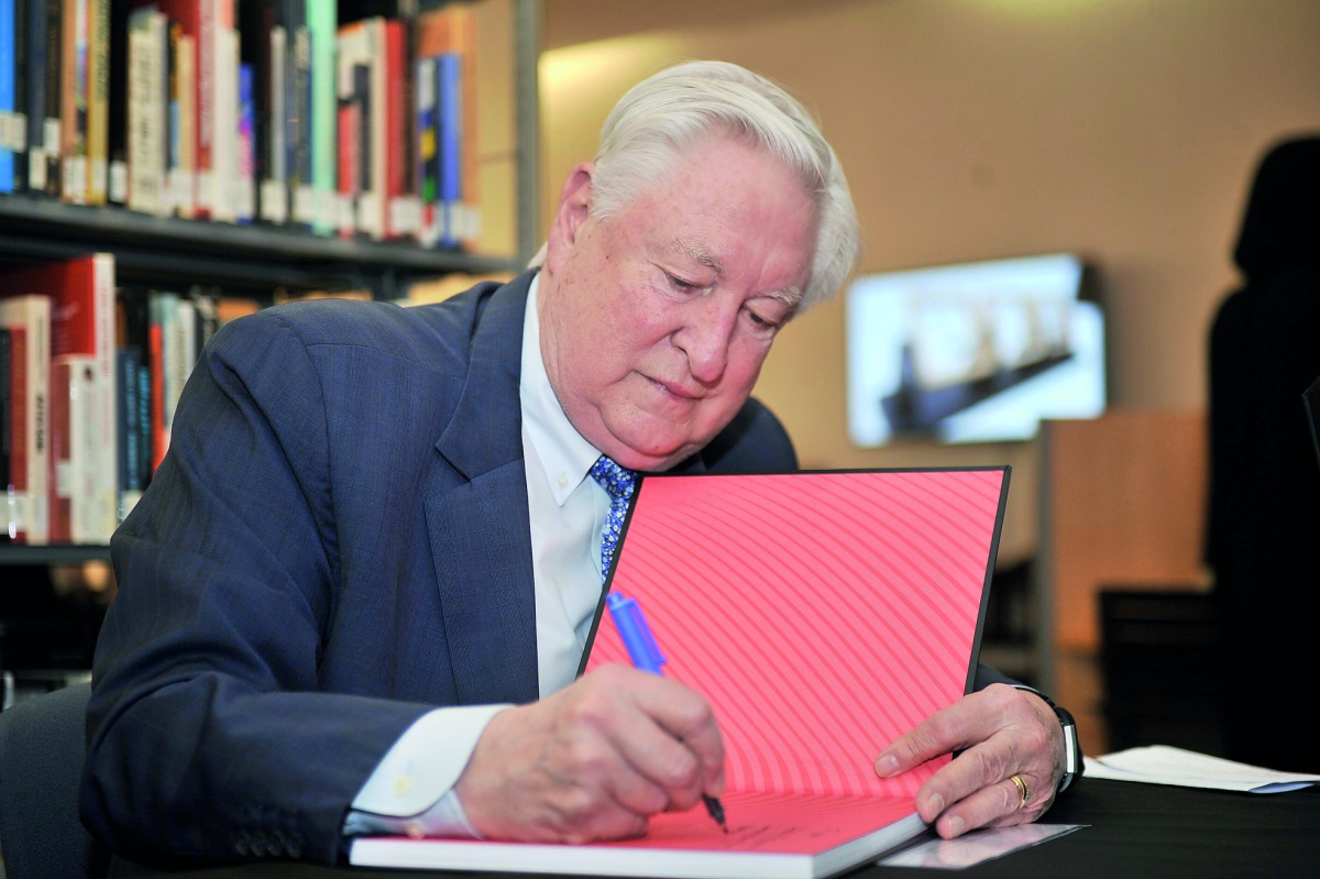 Dr Donald Baker, Executive Dean of VCUarts Qatar, signing the book duirng the launch event. Pic: Baher Amin / The Peninsula