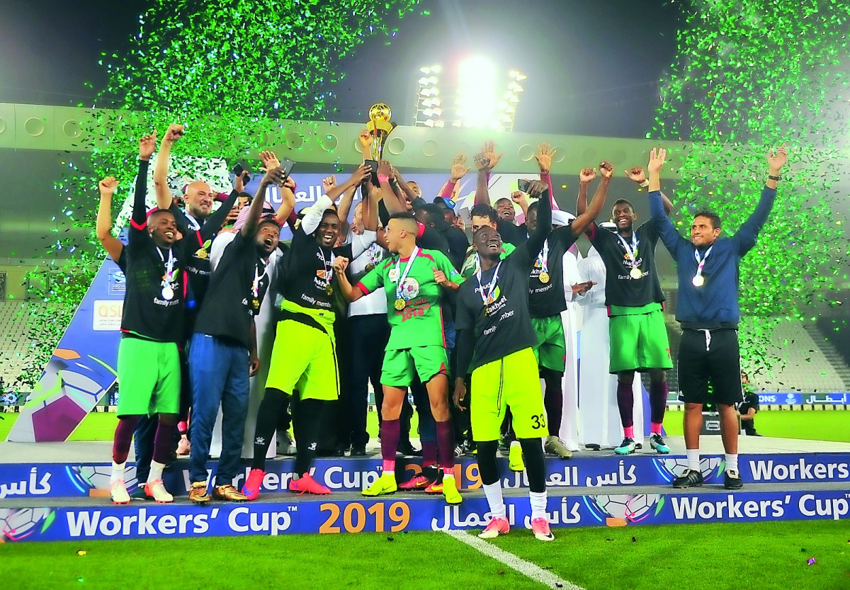 Nakheel Landscapes players celebrating their victory in the Workers’ Cup finals, at Al Sadd Sports Club, yesterday. PICs: BAHER  AMIN / THE PENINSULA