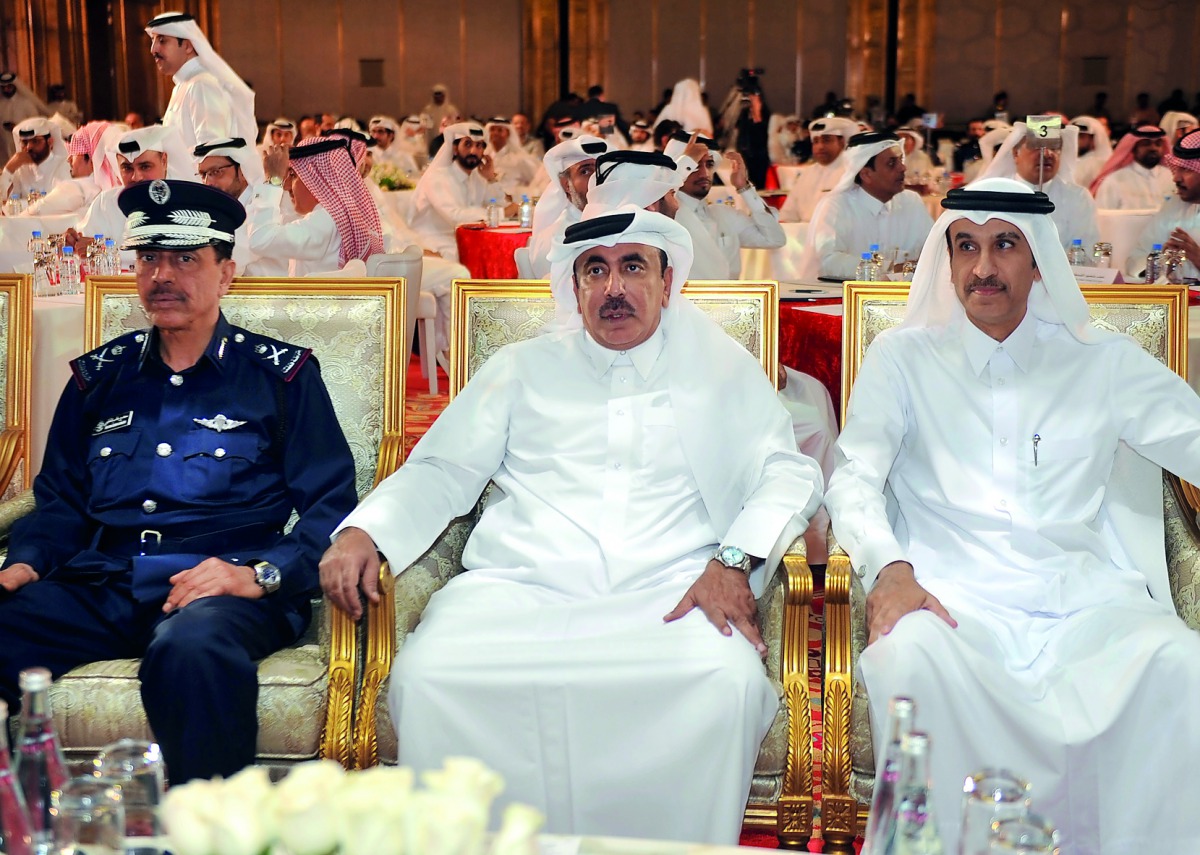 Minister of Transport and Communications, H E Jassim bin Saif Al Sulaiti (centre) with the Chairman of General Authority of Customs, Ahmed bin Abdullah Al Jamal (right) and Director General of Public Security Staff Major General, Saad bin Jassim Al Khulai