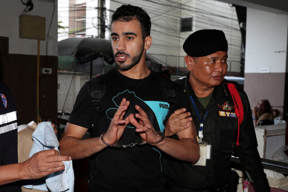 FILE PHOTO: Hakeem AlAraibi, a former member of Bahrain's national soccer team who holds a refugee status in Australia arrives at court after he was arrested last month on arrival at a Bangkok airport based on an Interpol notice issued at Bahrain's reques