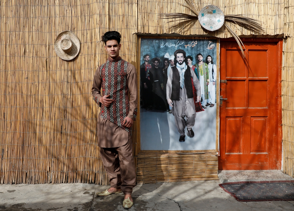 Afghan model Sultan Qasim Sayeedi, 18, poses for a picture in Kabul, Afghanistan, January 14, 2019.  Reuters/Mohammad Ismail 