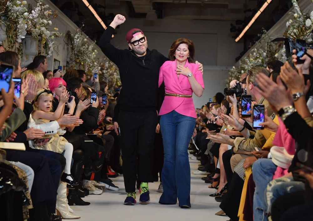 Designer Brandon Maxwell and his mother Pam Woolley walk the runway for the Brandon Maxwell fashion show during New York Fashion Week: The Shows at Penn Plaza Pavilion on February 9, 2019 in New York City. / AFP / Angela Weiss