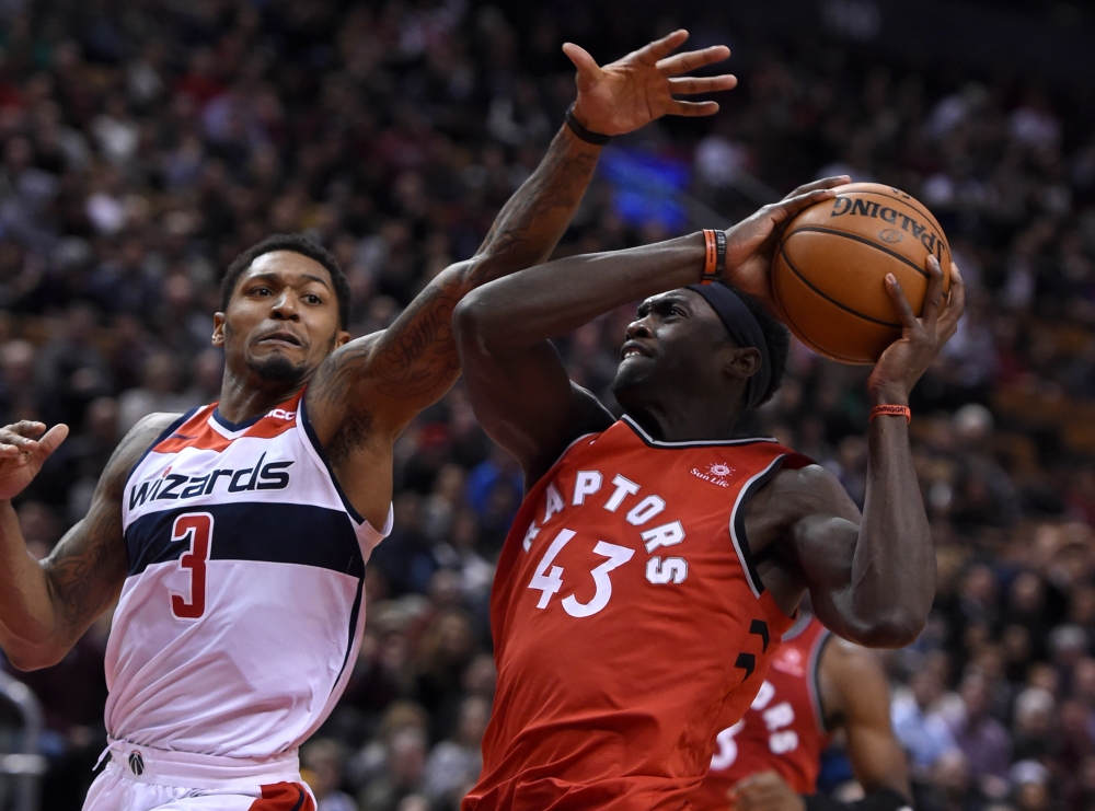 Toronto Raptors forward Pascal Siakam (43) drives to the basket as Washington Wizards guard Bradley Beal (3) defends in the second half at Scotiabank Arena. Dan Hamilton-USA TODAY Sports