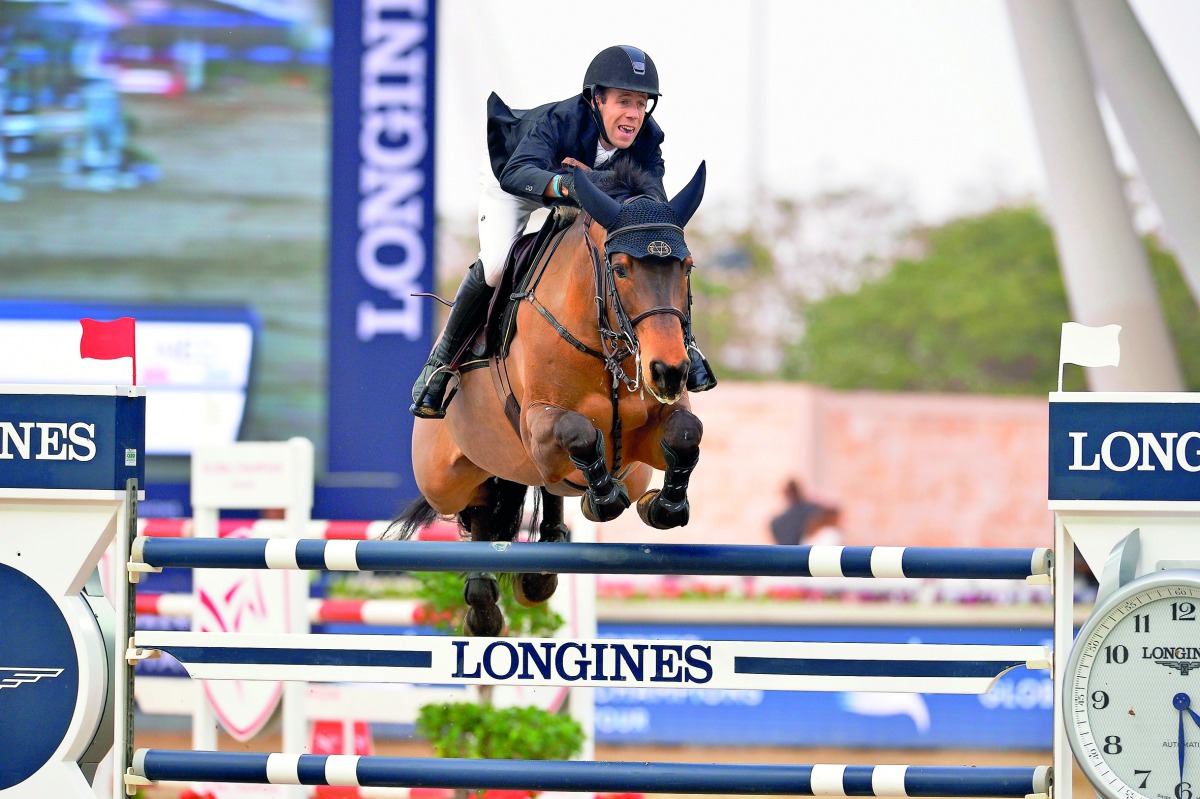 Maikel van der Vleuten guiding Arera C over a hurdle on his way to win the CSI5* 1.45m competition at Al Shaqab Arena, yesterday. 