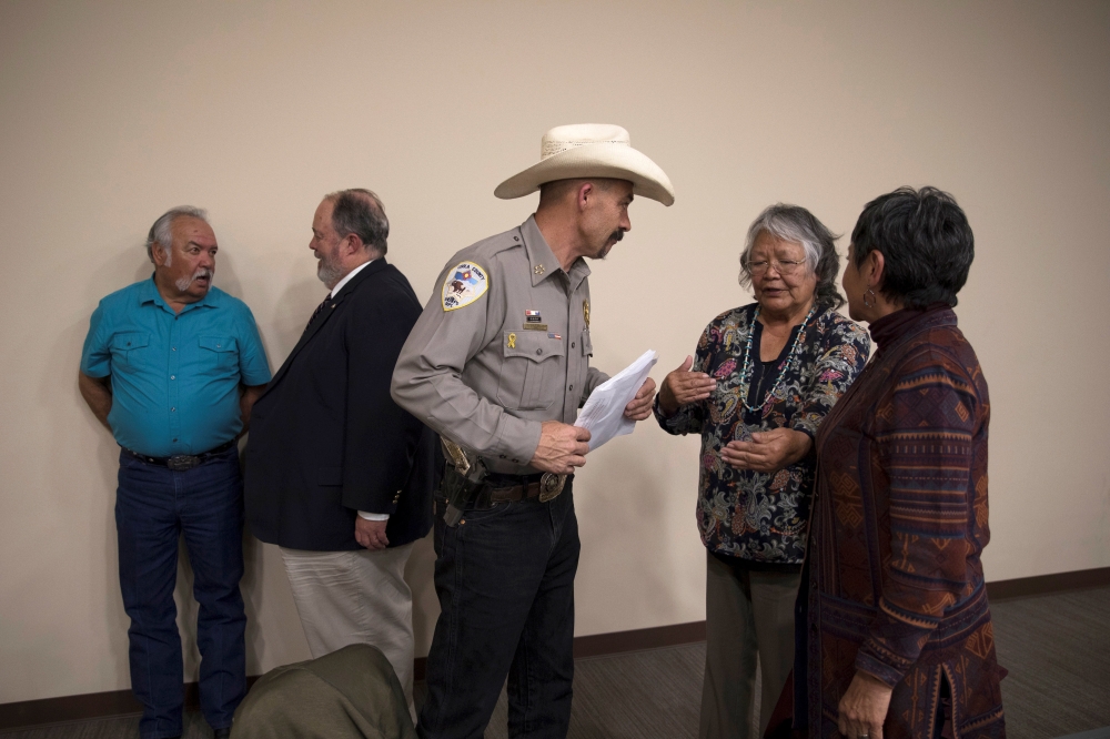 Cibola County Sheriff Tony Mace speaks to the county commissioners after the meeting adjourned following the passing of the Second Amendment Sanctuary status in Grants, New Mexico, US, February 28, 2019.  Reuters/Adria Malcolm