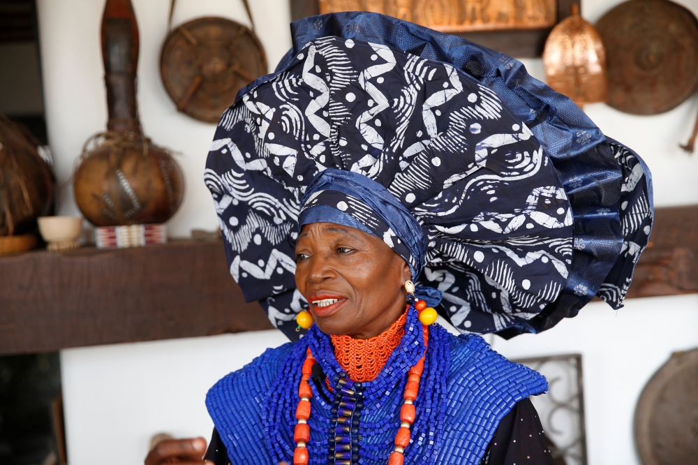 Nigerian artist and designer Chief Nike Davies-Okundaye speaks to Reuters journalists during a gala marking the launch of a book called 