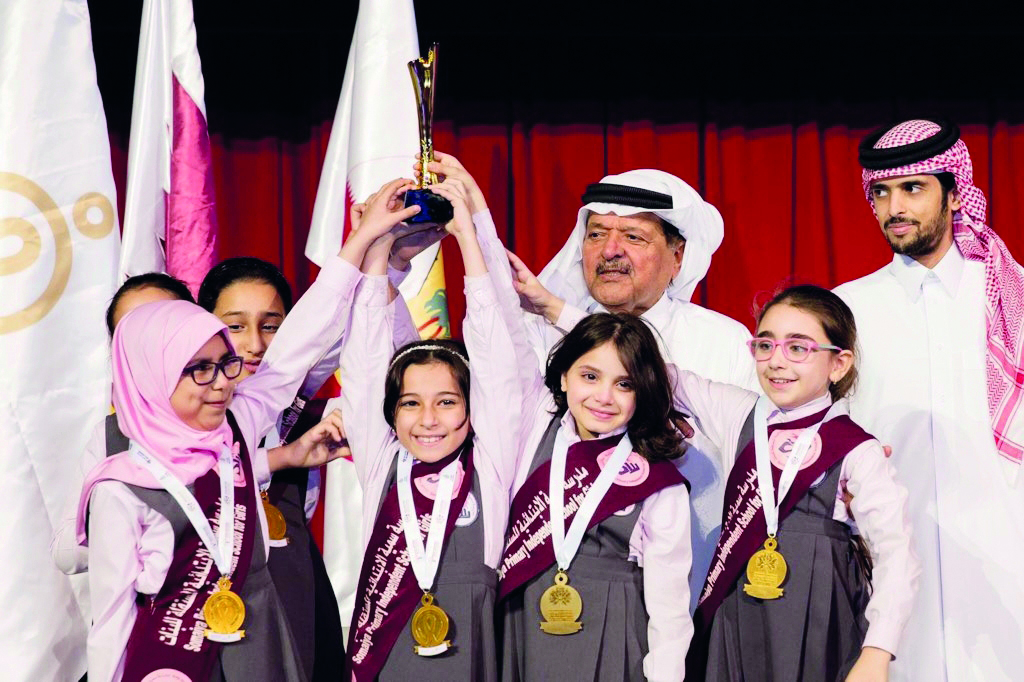 Sheikh Faisal bin Qasim Al Thani, Founder and Chairman of the Board of Directors Al Faisal Without Borders Foundation, with winners at the ceremony held at QNCC on Sunday.