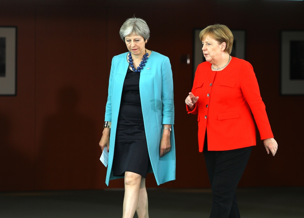 German Chancellor Angela Merkel meets with British Prime Minister Theresa May for talks on July 5, 2018, in Berlin. AFP/Omer Messinger