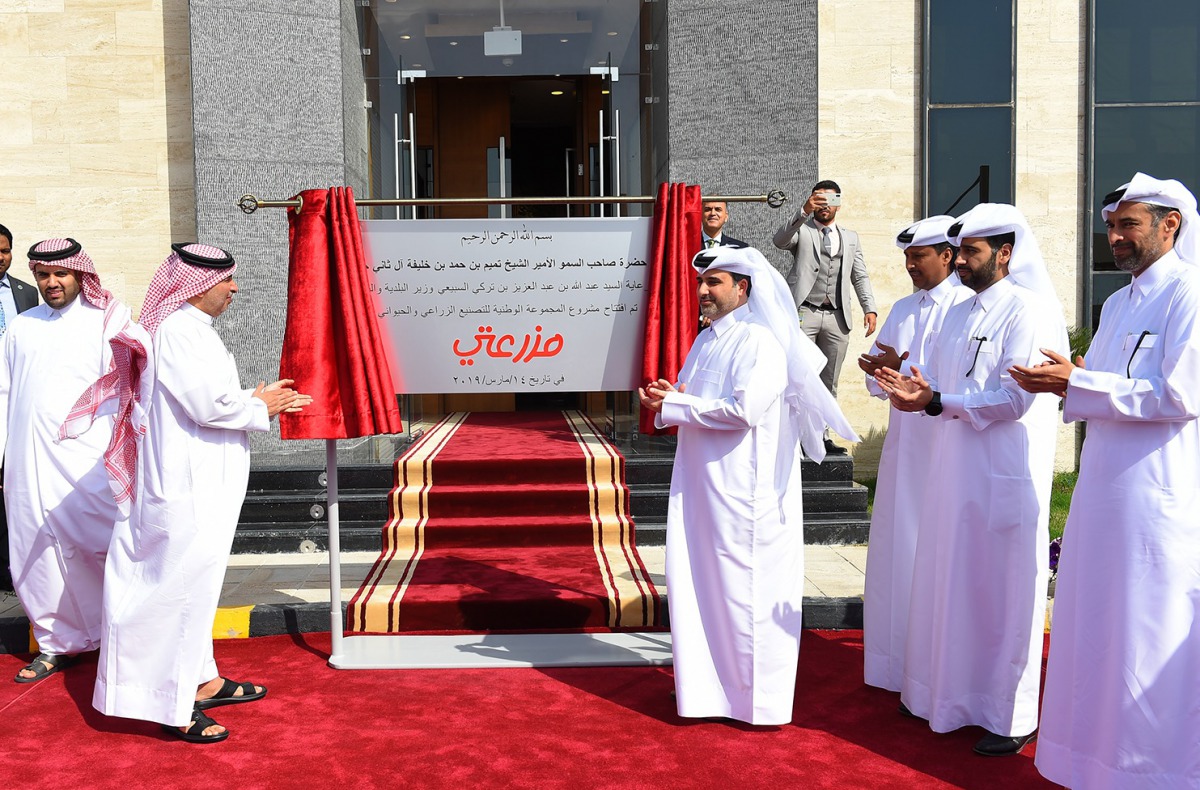 Minister of Municipality and Environment H E Abdullah bin Abdulaziz bin Turki Al Subaie with other officials during the opening of Mazzraty poultry farm, yesterday.