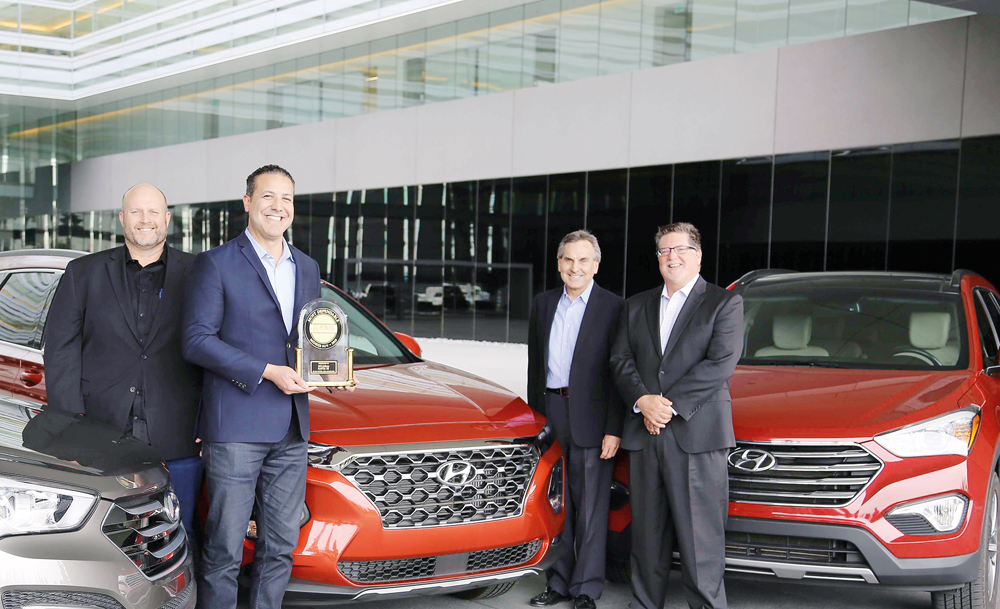 The officials of Hyundai’s Santa Fe with the award.