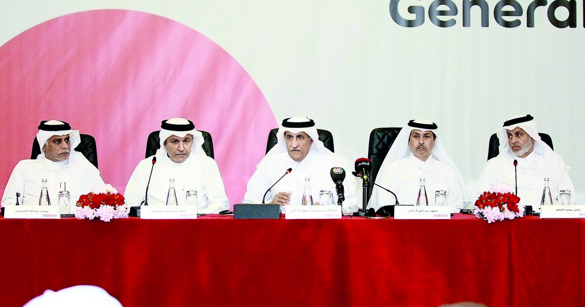 Sheikh Abdulla bin Mohammed bin Saud Al Thani (centre), Ooredoo Chairman; Sheikh Saud bin Nasser Al Thani (second right), Ooredoo Group CEO; and other board members and senior officials during the AGM, yesterday. 