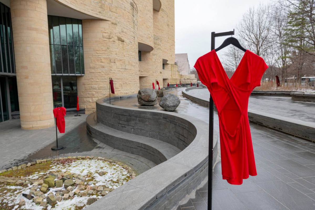 Dresses hang on the grounds of the National Museum of the American Indian in Washington, D.C. on March 1, 2019, as part of the REDress Project, an art installation by artist Jaime Black. Handout photo by National Museum of the American Indian staff. 