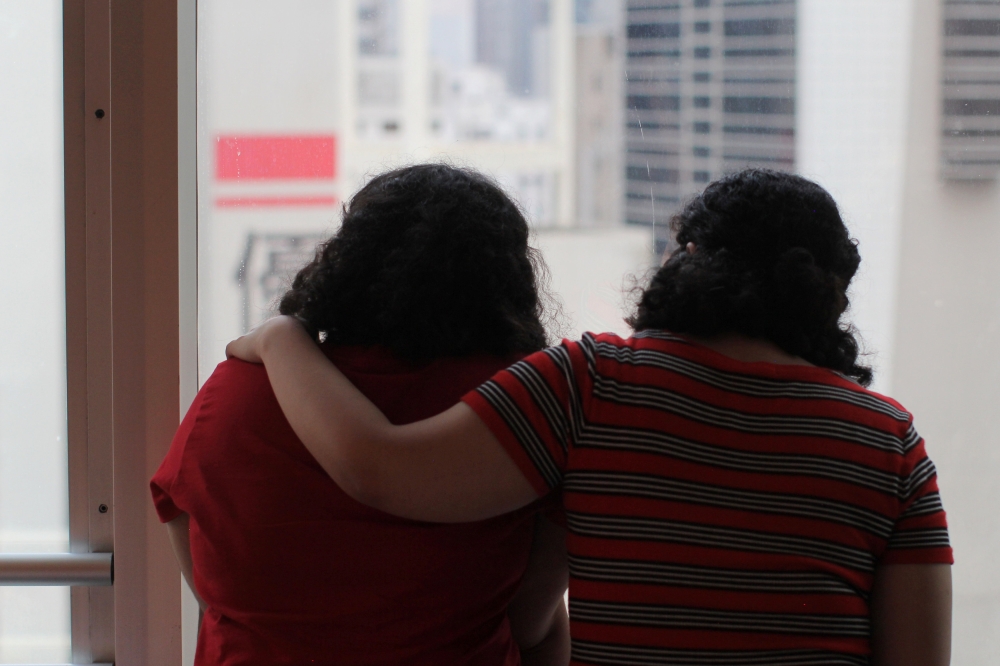 Sisters from Saudi Arabia, who go by aliases Reem and Rawan, are pictured in Hong Kong, China March 20, 2019. Picture taken March 20, 2019. REUTERS/Yuyang Wang