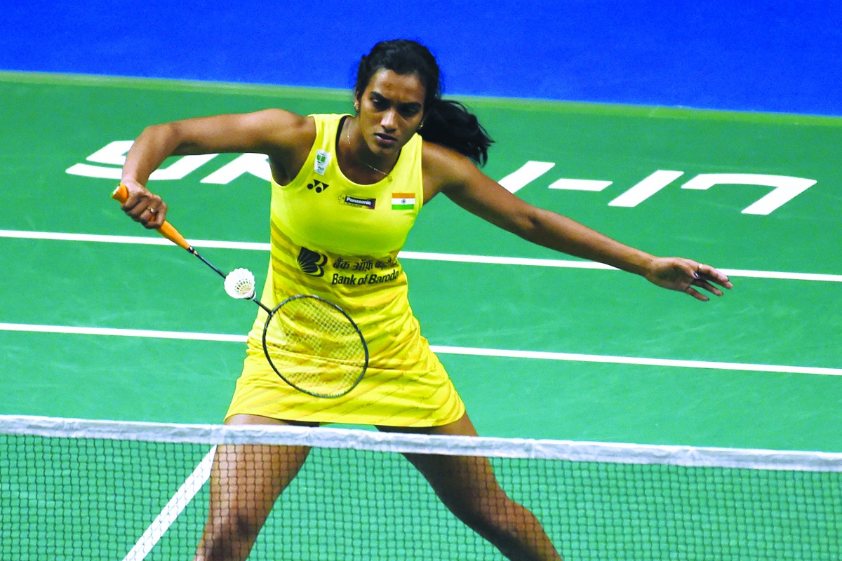 PV Sindhu of India plays a shot against Carolina Marin of Spain during the women’s singles quarter-final of the Singapore Open badminton tournament in Singapore in this April 14, 2017 file picture.