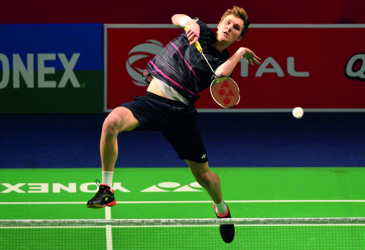 Denmark's badminton player Viktor Axelsen plays a return against Thailand badminton player Suppanyu Avihingsanon during the men's singles second round badminton match at the Yonex-Sunrise India Open 2019 in New Delhi on March 28, 2019. AFP / Sajjad Hussai