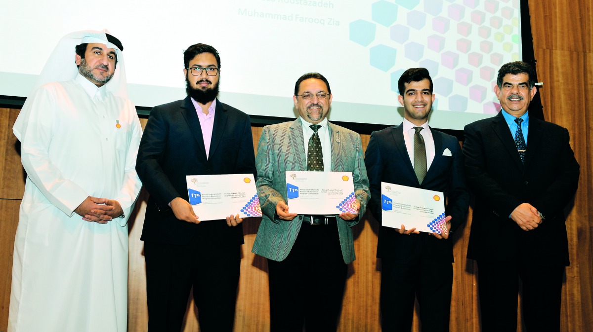 Hussain Al Hijji (left), Vice-President, Qatar Shell Research and Technology Centre; and Dr Abdul Sattar Al Taie (right), Executive Director, Qatar National Research Fund (QNRF), with winners of 11th Annual Undergraduate Research Experience Program Compet