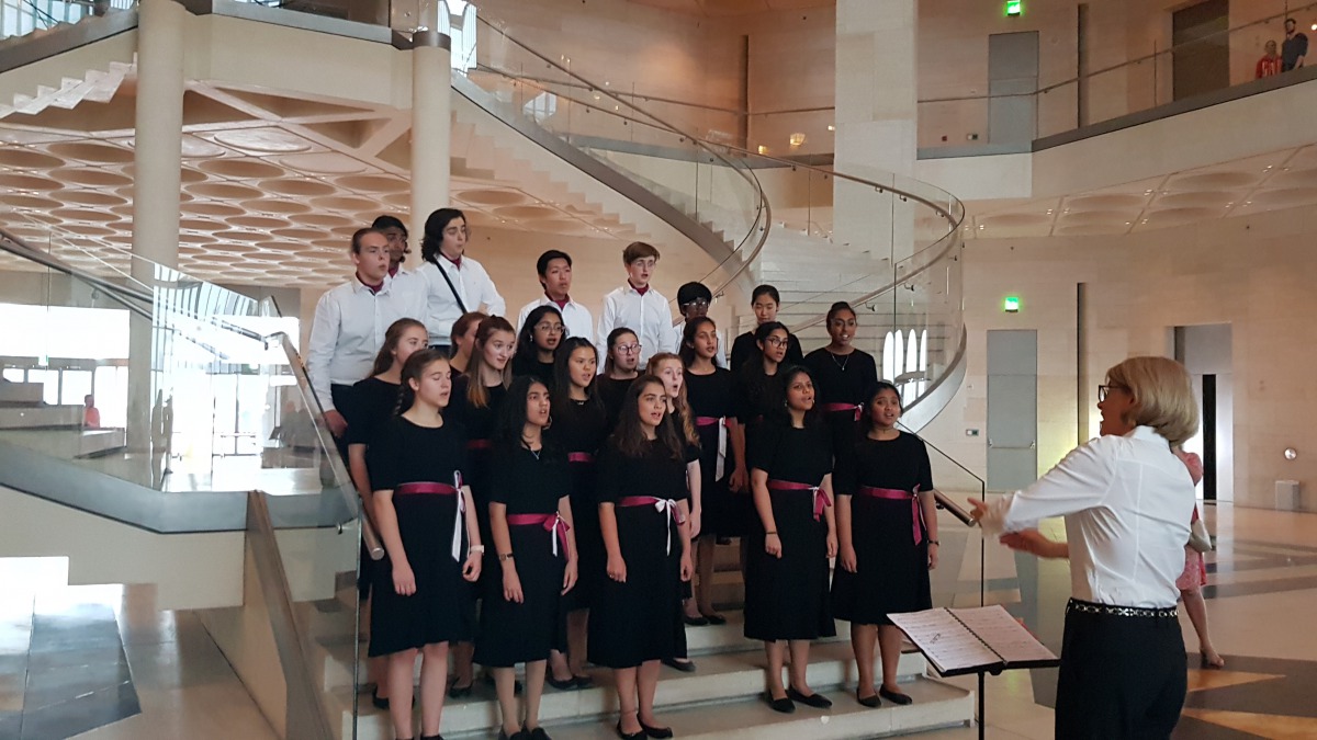 Qatar Youth Choir in performance with conductor Alena Pyne