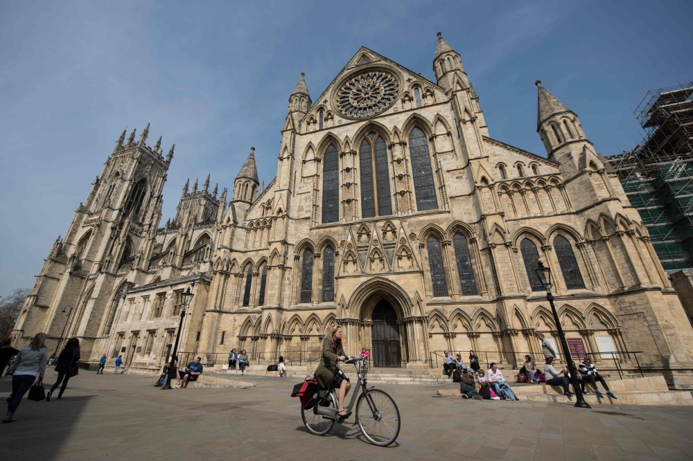 A general view shows the exterior of York Minster in York, northern England, on April 18, 2019.  AFP / Oli Scarff 