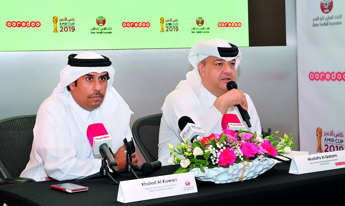 Khaled Al Kuwari (left), Director, Marketing and Communication, Qatar Football Association; and  Mustafa Al Qatami, Senior Director, Marketing and Communication, Ooredoo; at a press conference yesterday. Pic: Salim Matramkot/The Peninsula