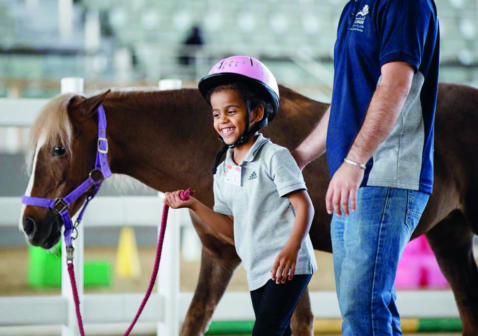 A file picture of a child taking part in a training session at Al Shaqab Arena in this file picture.