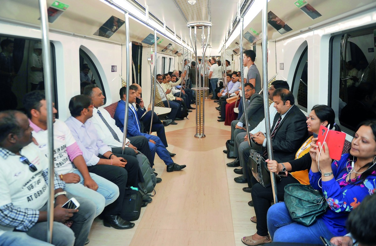 Passengers enjoying the first ride in Doha Metro Red Line from Al Wakra to Al Qassar, yesterday. Pic: Abdul Basit/The Peninsula