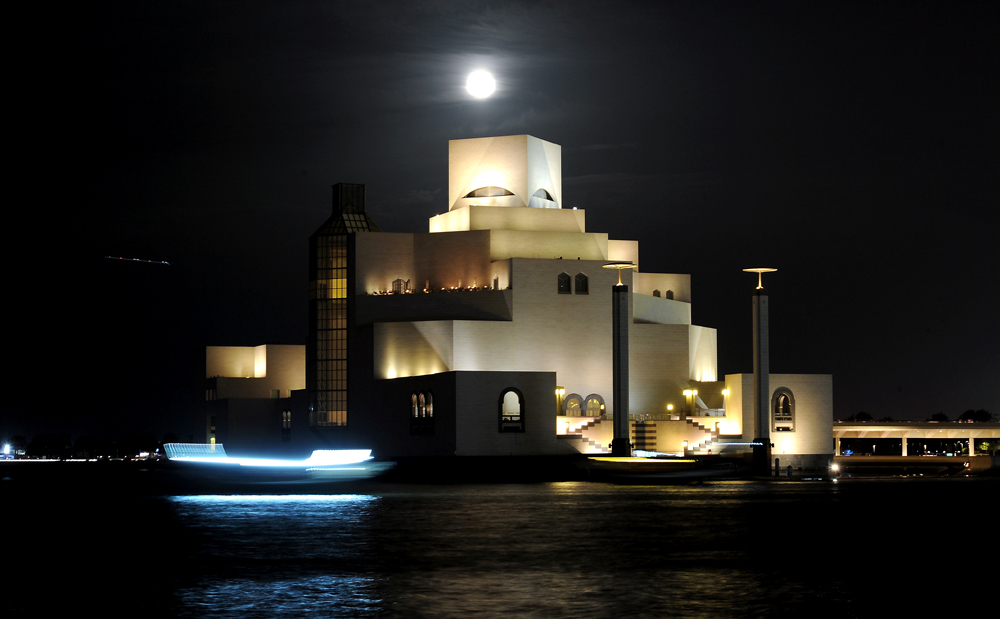 FILE PHOTO: An Arabian dhow sailing pasts the Museum Of Islamic Art (MIA), bathed in the milky-light of full moon in Doha last evening. March, 18 2019. Salim Matramkot/The Peninsula