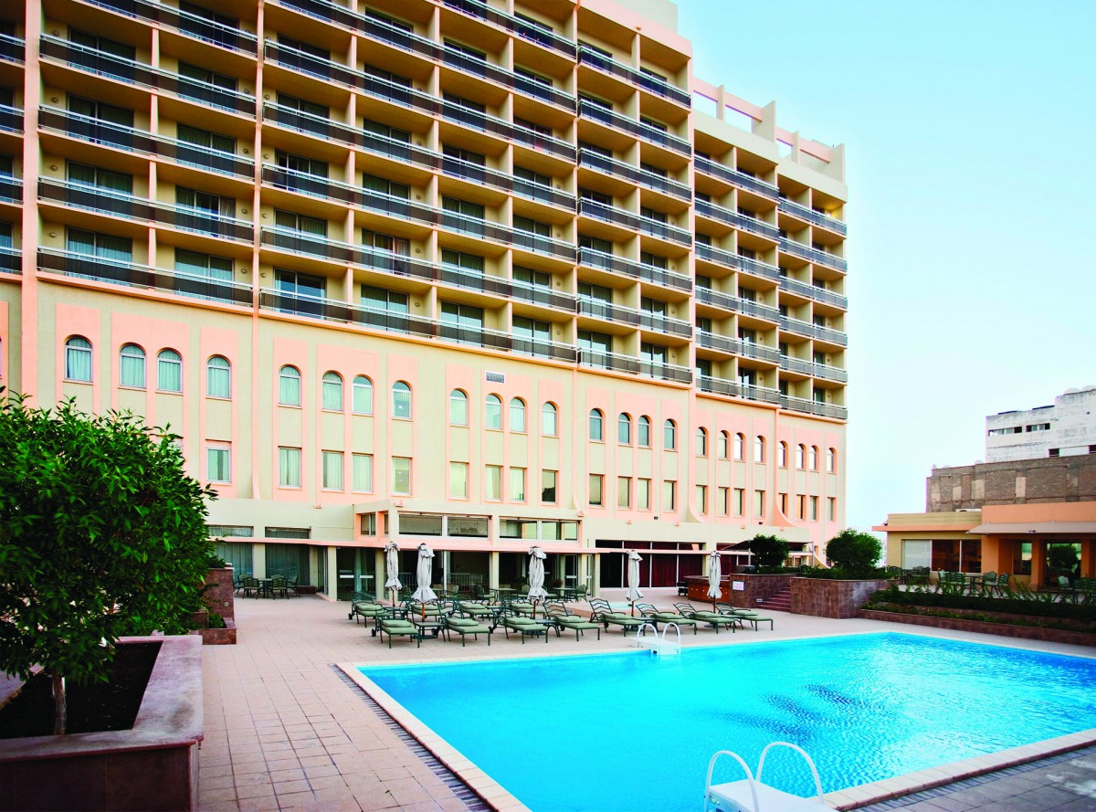 A general pool-side view of Mercure Grand Hotel. The hotel, located  next to the Msheireb Metro Station, is offering a number of room, pool and beverage packages to its customers during Eid and summer.  