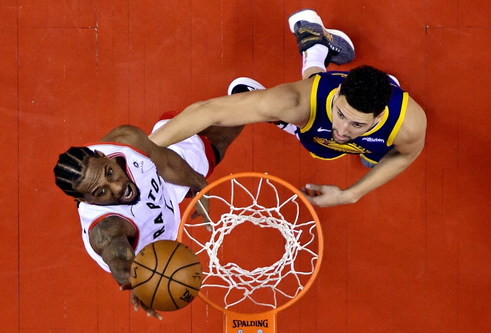  Toronto Raptors forward Kawhi Leonard (2) shoots the ball against Golden State Warriors guard Klay Thompson (11) in game five of the 2019 NBA Finals at Scotiabank Arena. Nathan Denette/Pool Photo 