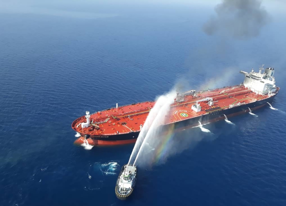 An Iranian navy boat trying to control fire from Norwegian owned Front Altair tanker said to have been attacked in the waters of the Gulf of Oman. 