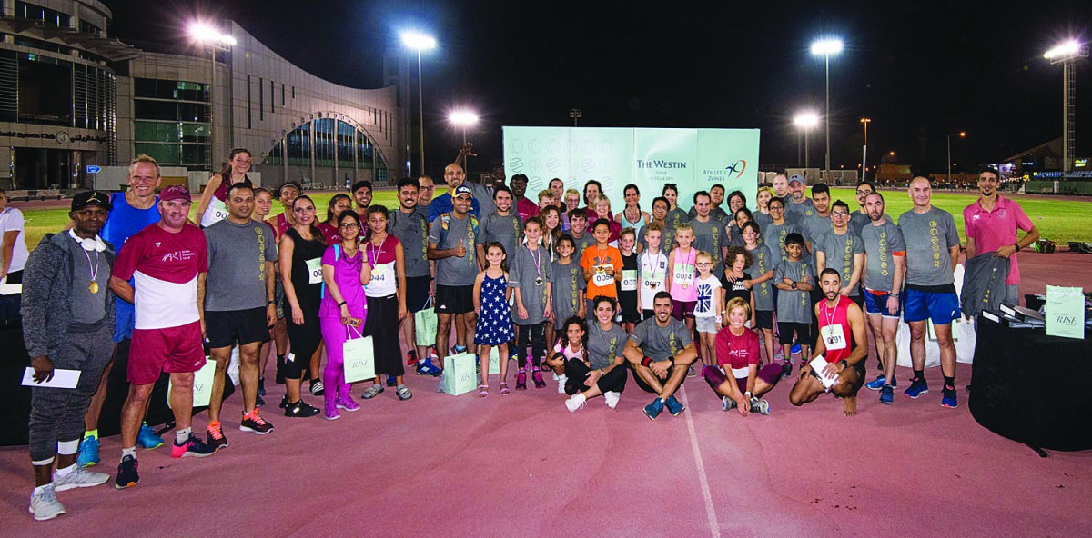 The participants posing for a group picture on the occasion of the Global Running Day.