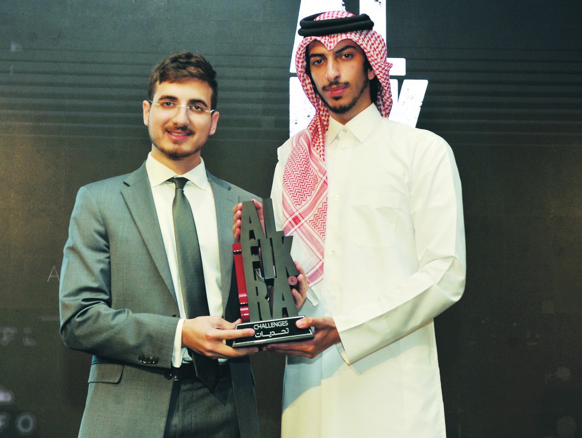 ‘i-fuel’ founders Nasser Al Kaabi (right) and Jamal Khatib, posing with their award after winning at the Al-Fikra 2019 on Tuesday. Pic: Abdul Basit / the peninsula