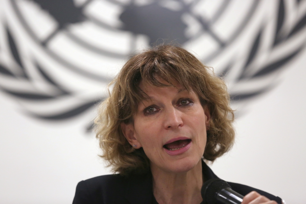 FILE PHOTO: Agnes Callamard, the U.N. special investigator on extrajudicial, summary or arbitrary executions, speaks to reporters in San Salvador, El Salvador, February 5, 2018. REUTERS/Jose Cabezas/File Photo