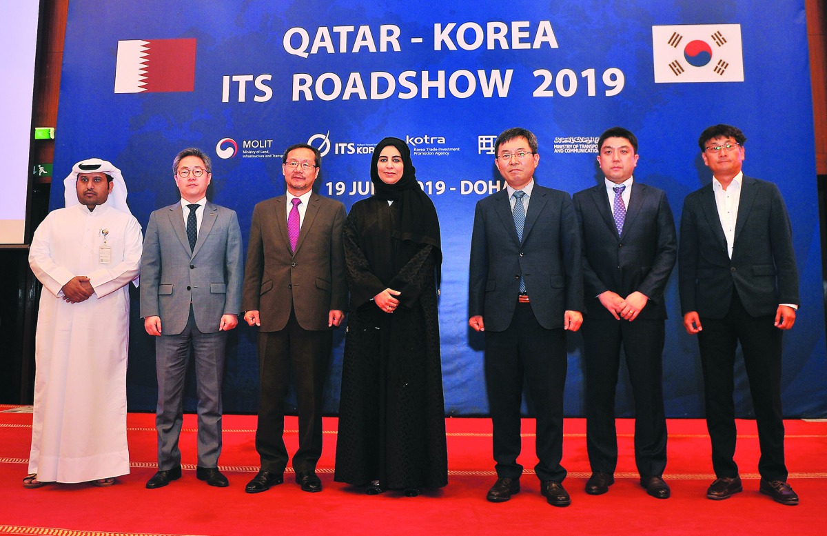 South Korea’s Ambassador to Qatar Chang-mo Kim (third left), Reem Mohamed Al Mansoori (centre); Assistant Undersecretary of Digital Society Development at the Ministry of Transport and Communications, and Sung Seup Kang (third right); Director of ITS and 