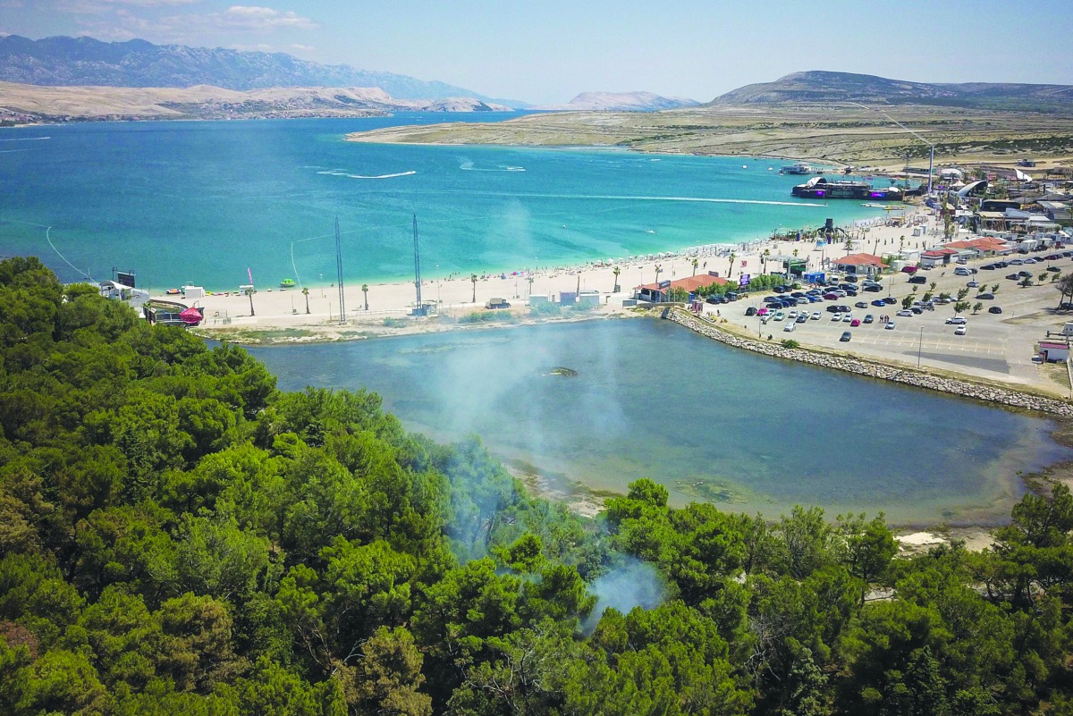 This aerial view taken on July 16, 2019, shows a general view of Zrce beach on the northern Croatian island of Pag.  AFP