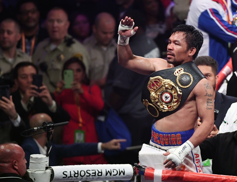 Manny Pacquiao celebrates his split-decision victory over Keith Thurman in their WBA welterweight title fight at MGM Grand Garden Arena on July 20, 2019 in Las Vegas, Nevada. (Ethan Miller/Getty Images/AFP)