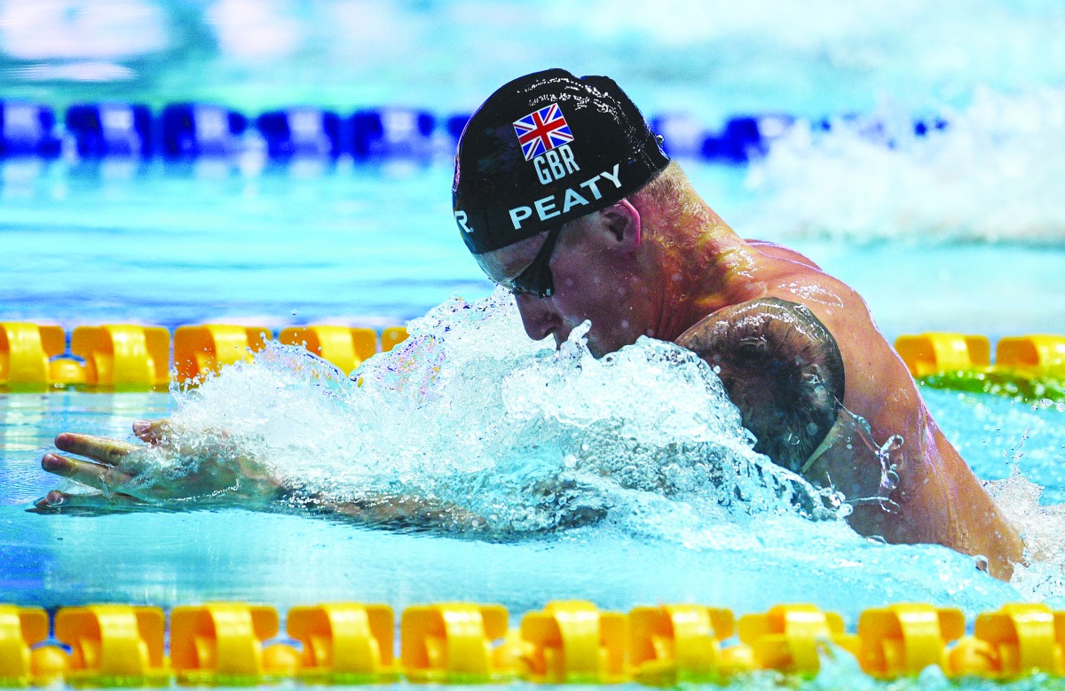 Britain's Adam Peaty competes to win the semi-final of the men's 100m breaststroke event during the swimming competition at the 2019 World Championships at Nambu University Municipal Aquatics Center in Gwangju, South Korea, on July 21, 2019. AFP / Oli Sca