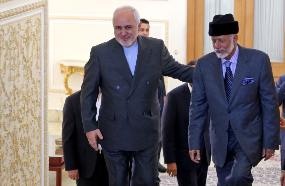 Oman's Minister of State for Foreign Affairs Yousuf bin Alawi bin Abdullah (R) is greeted by Iran's Foreign Minister Mohammad Javad Zarif in Tehran on July 27, 2019. (AFP / ATTA KENARE)