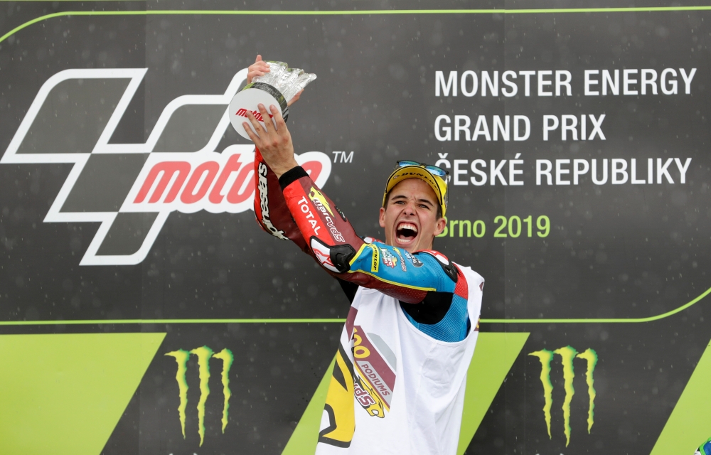 Alex Marquez celebrates with the trophy after winning the Moto2 race REUTERS/David W Cerny