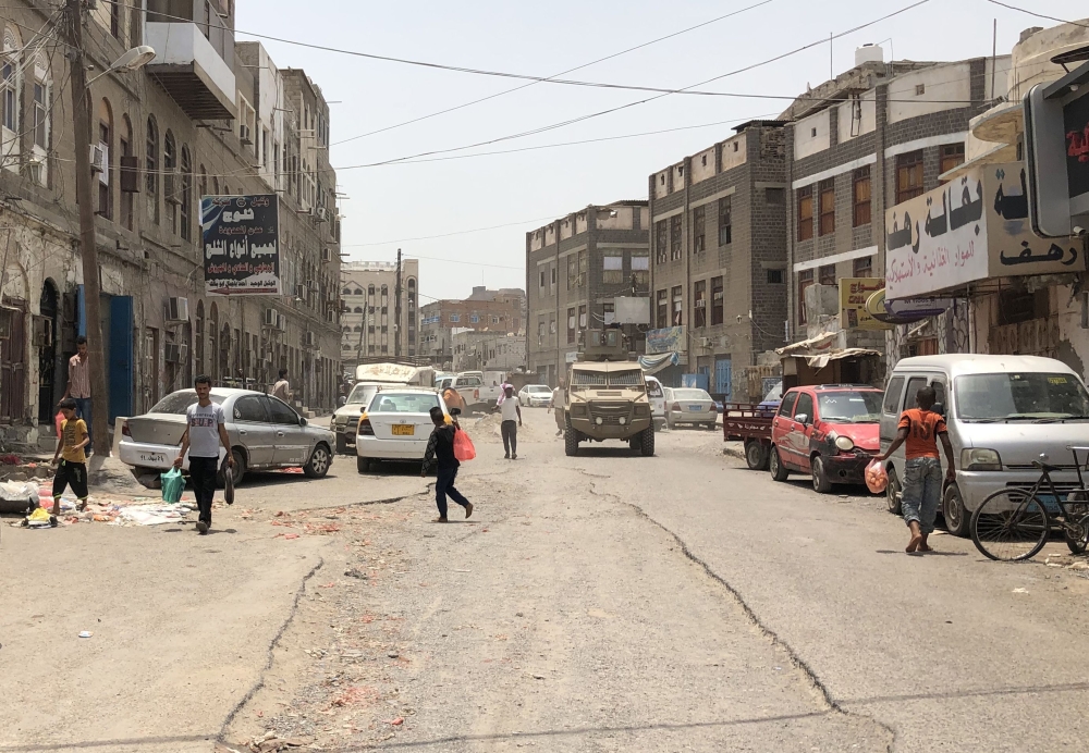 A member of the southern separatist movement rides an armoured military vehicle in Yemen's government-held second city Aden on August 11, 2019, following clashes between pro-government forces and separatists. (AFP / Nabil HASAN)