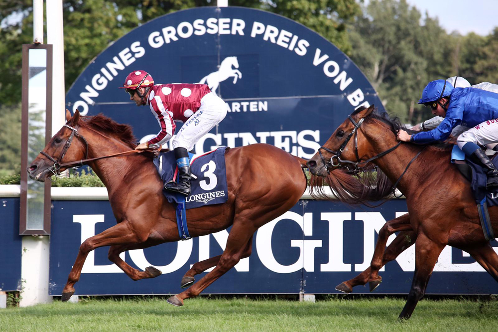 Jockey Olivier Peslier  (left) and H H Sheikh Abdullah bin Khalifa Al Thani-owned French King winning the 129th Longines Grosser Preis von Berlin (Gr1) at Hoppegarten, in Germany, on Sunday.
