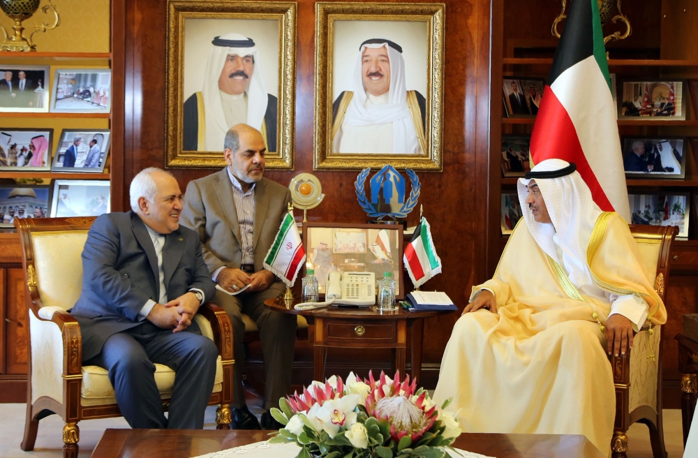 Kuwait's Foreign Minister Sheikh Sabah al-Khaled al-Sabah (R), meeting with Iranian Foreign Minister Mohammad Javad Zarif in Kuwait City. 