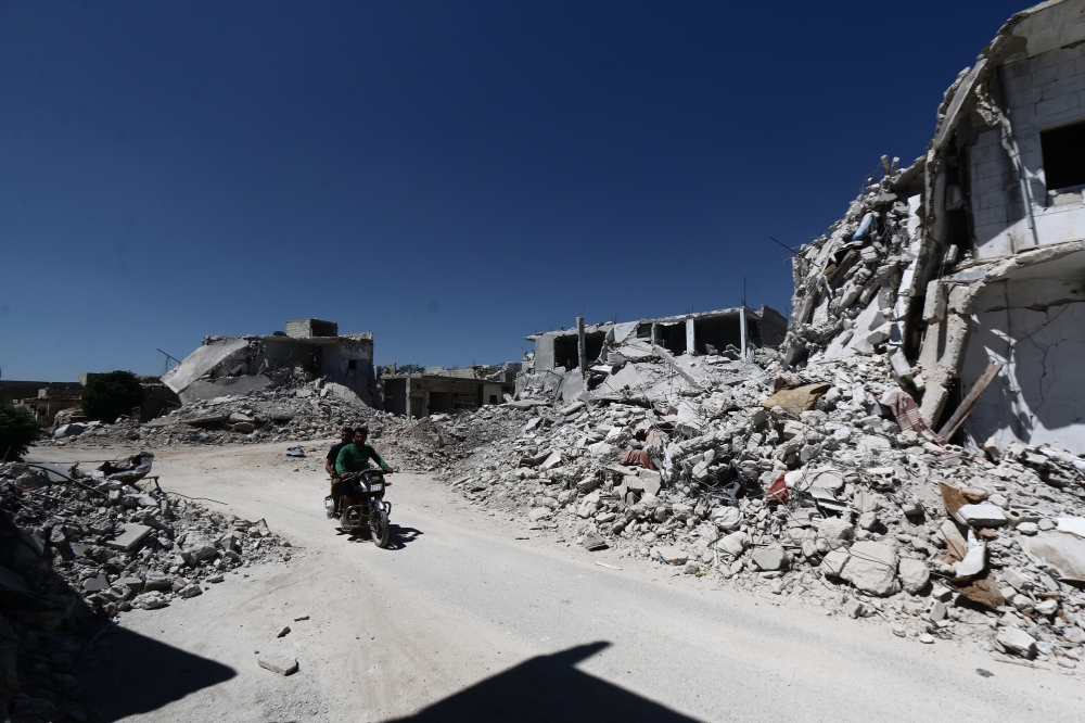 Debris of buildings are seen after Russian airstrike hit Idlib, de-escalation zone, Syria on August 26, 2019. The airstrike killed 6 civilians, injuring 12. Muhammed Said - Anadolu